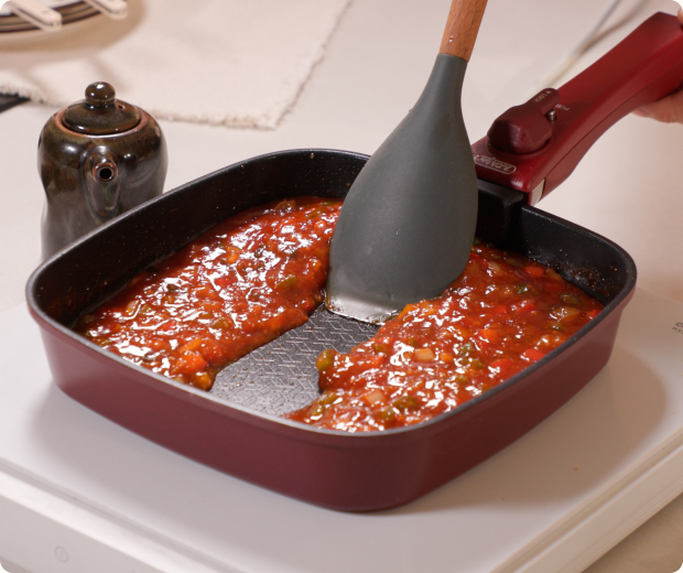 Why food sticks—and what surface design can change.