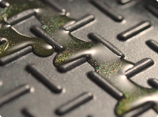 How the Oil Road grill surface manages rendered fat.