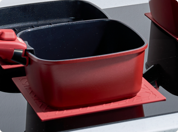 Protecting an induction cooktop starts with how you move cookware.