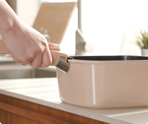 Protecting an induction cooktop starts with how you move cookware.